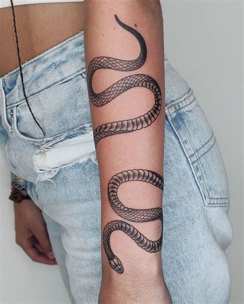 wrap around snake tattoo arm|17 Snakes Wrapped Around Arm Tattoo Designs & Ideas